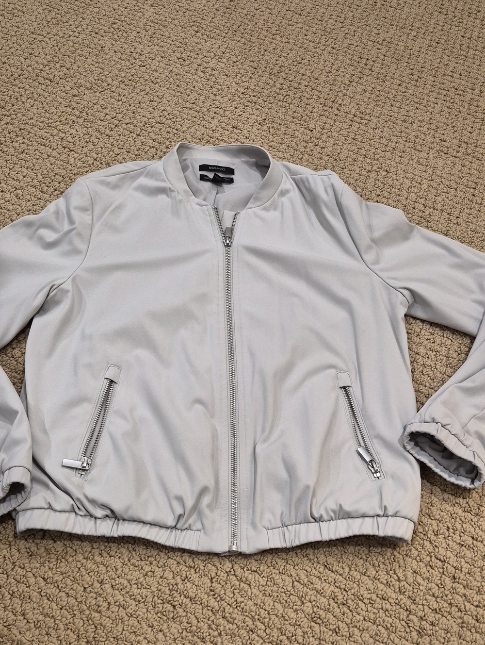 RW&CO. Black Logo Clothing Label on Light Gray Lining